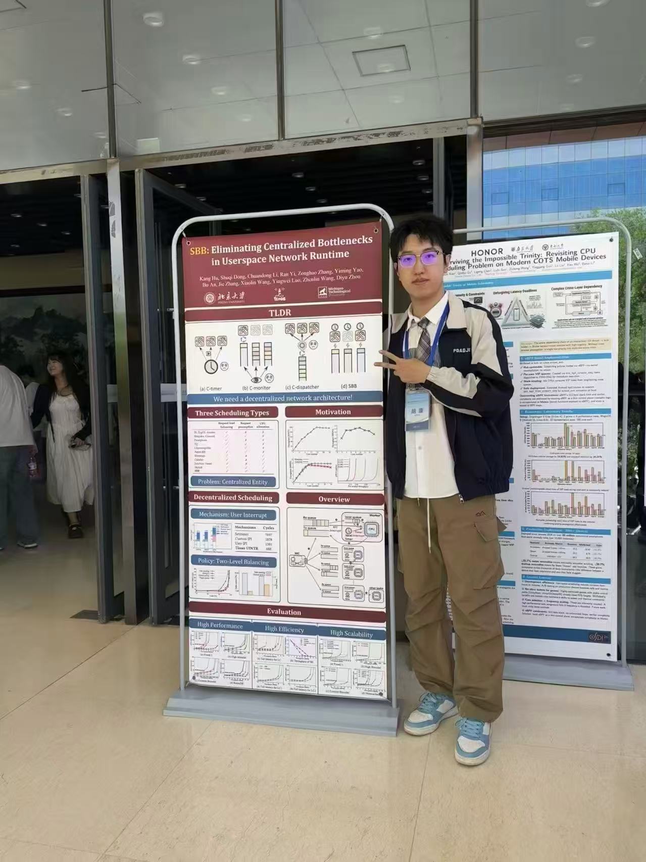 Kang Hu presenting the SBB poster at ChinaSys 2026